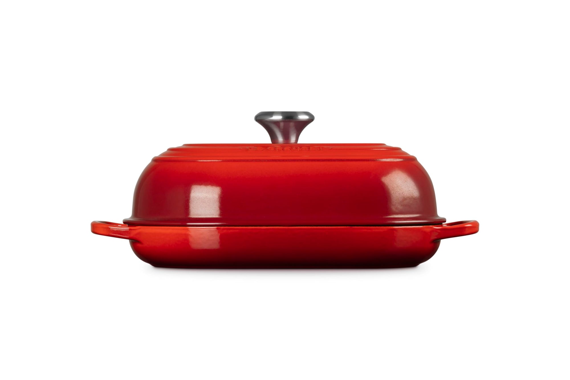 Side view of Cerise bread oven pan with lid and handles displayed on a white background