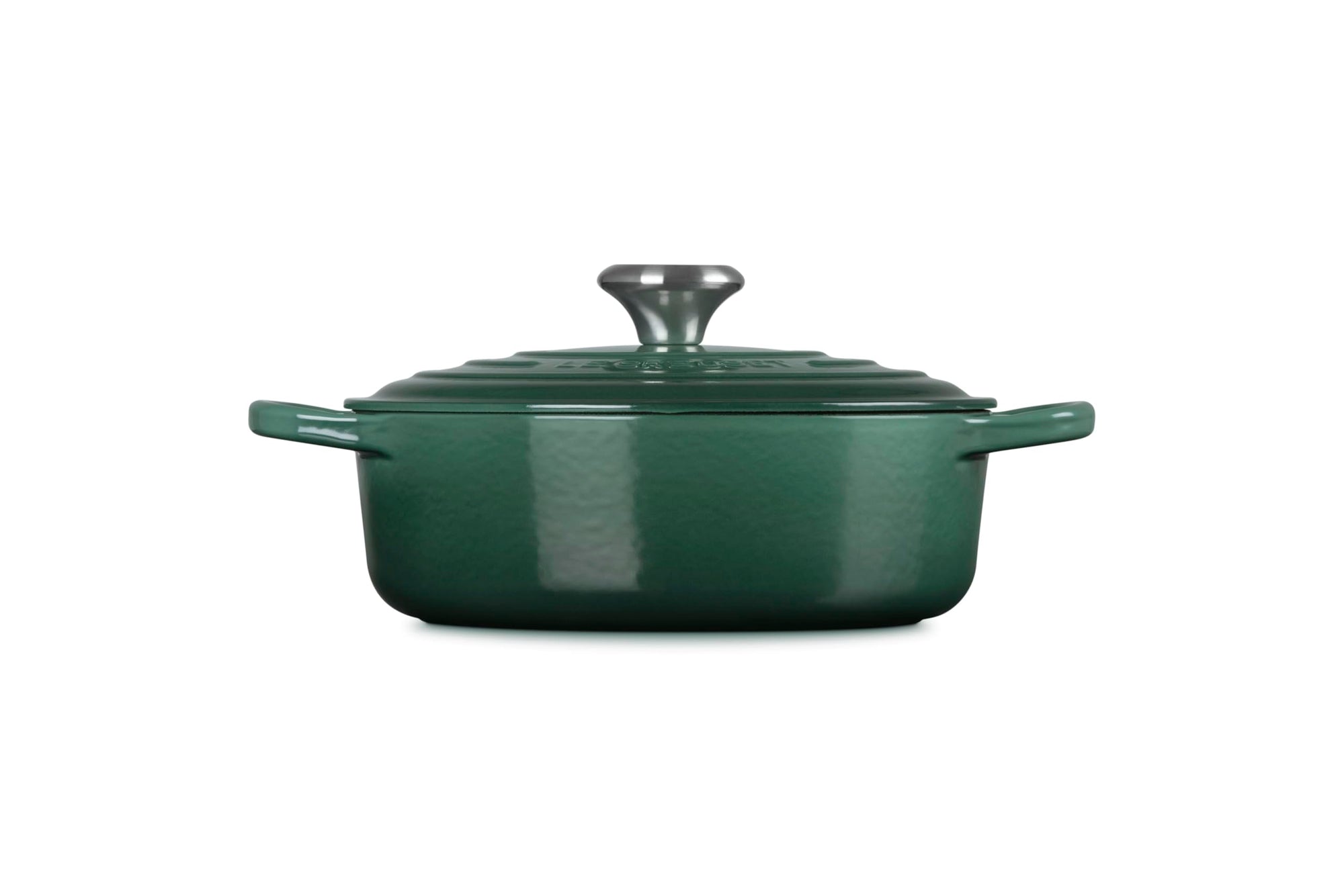 Side view of 3.5 qt artichaut Le Creuset Signature Round Wide Dutch Oven with a lid displayed on a white background