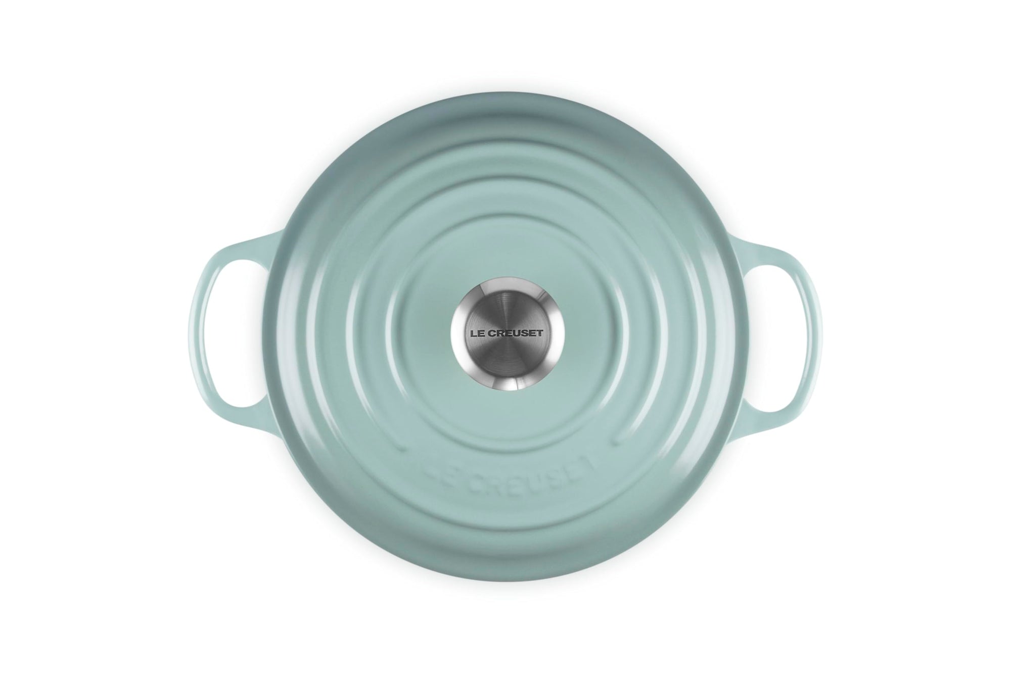 Top view of 3.5 qt Sea salt Le Creuset Signature Round Wide Dutch Oven with a lid displayed on a white background