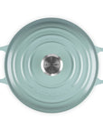 Top view of 3.5 qt Sea salt Le Creuset Signature Round Wide Dutch Oven with a lid displayed on a white background