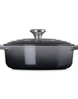 Side view of 3.5 qt Oyster Le Creuset Signature Round Wide Dutch Oven with a lid displayed on a white background
