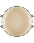 Top view of 3.5 qt Oyster Le Creuset Signature Round Wide Dutch Oven displayed on a white background