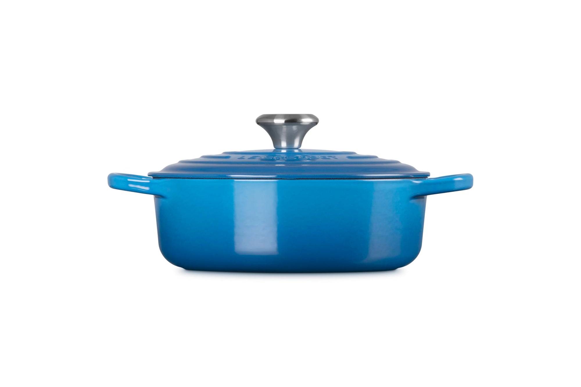 Side view of 3.5 qt Marseille Le Creuset Signature Round Wide Dutch Oven with a lid displayed on a white background