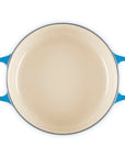 Top view of 3.5 qt Marseille Le Creuset Signature Round Wide Dutch Oven displayed on a white background