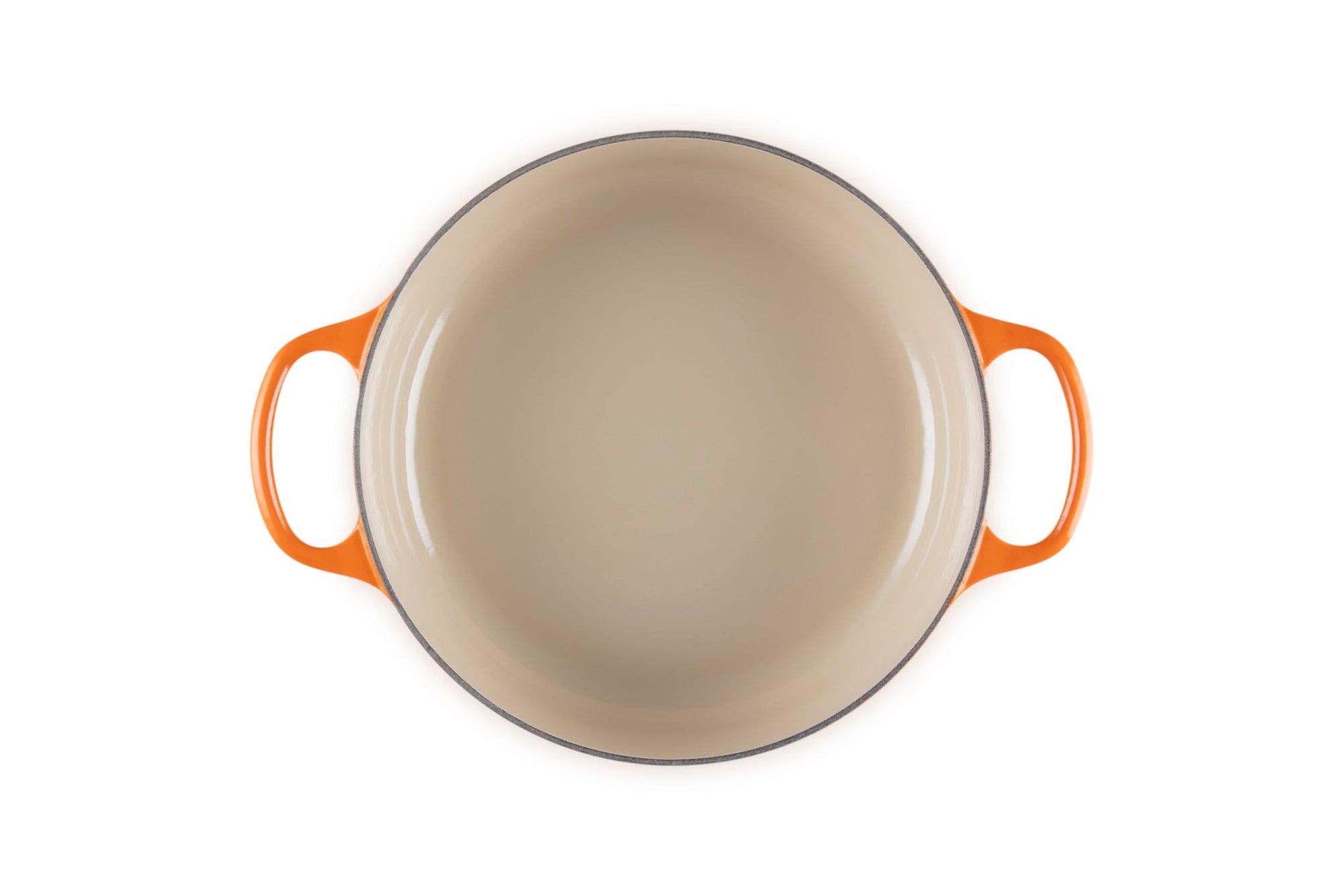 Top view of 3.5 qt flame Le Creuset Signature Round Wide Dutch Oven displayed on a white background