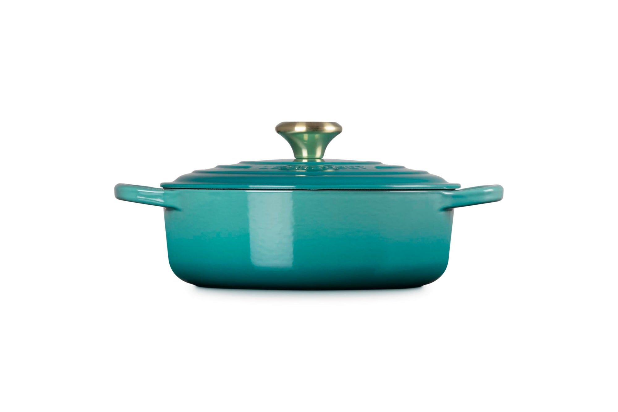 Side view of 3.5 qt riviera Le Creuset Signature Round Wide Dutch Oven with a lid displayed on a white background