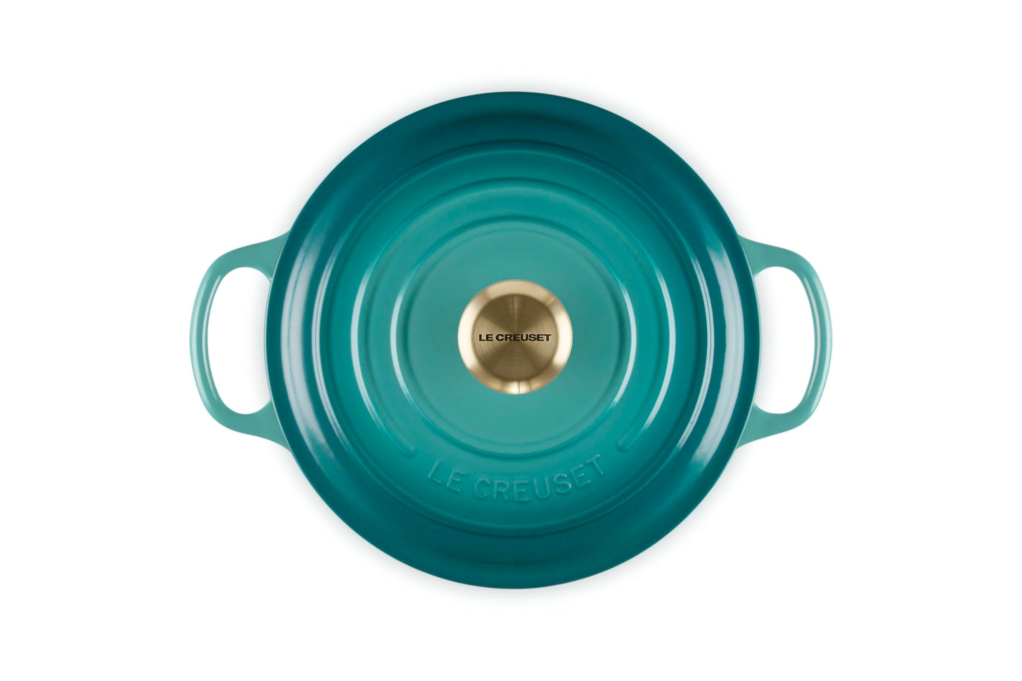 Top view of 3.5 qt riviera Le Creuset Signature Round Wide Dutch Oven with a lid displayed on a white background