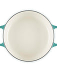 Top view of 3.5 qt riviera Le Creuset Signature Round Wide Dutch Oven displayed on a white background