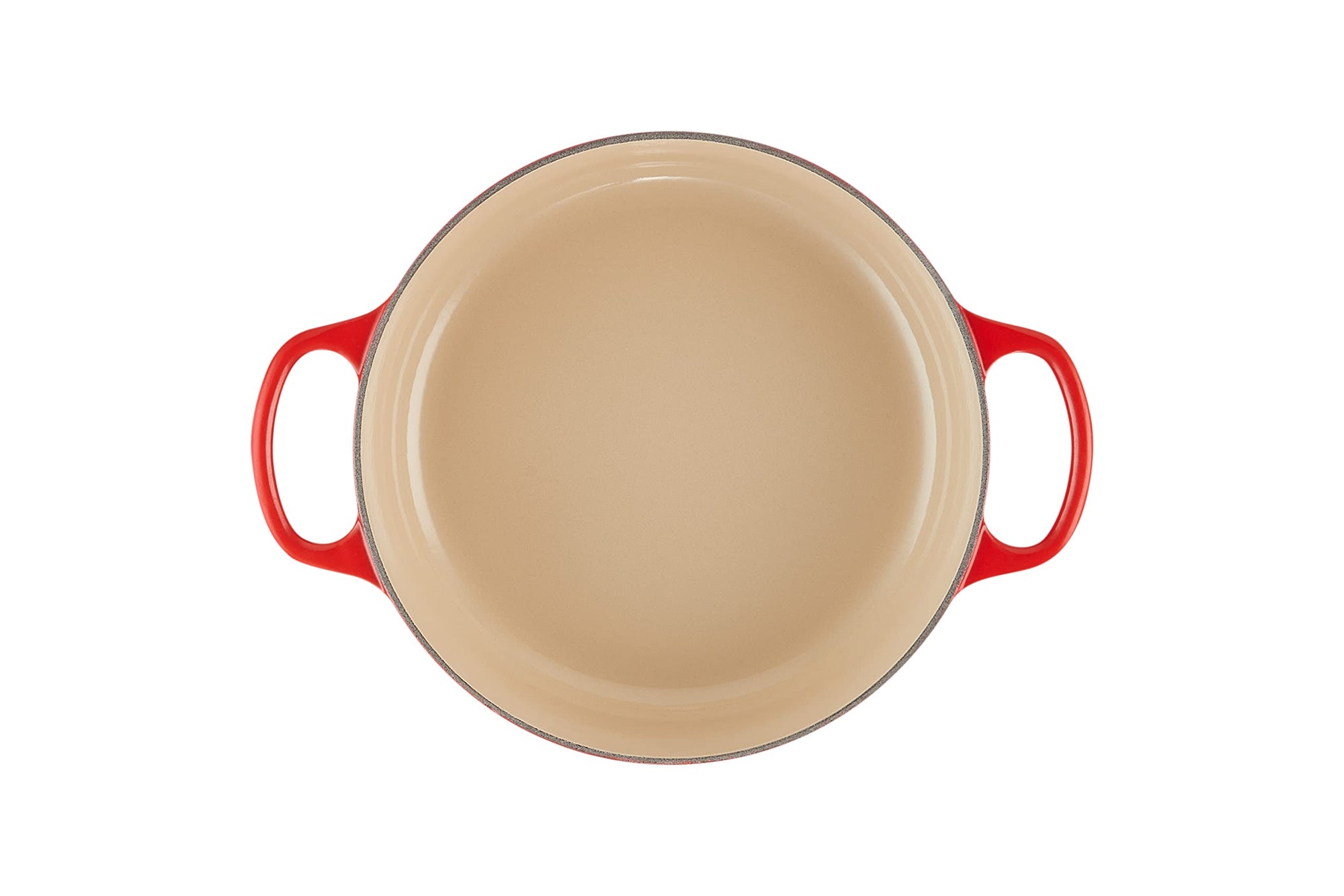 Top view of 3.5 qt cerise Le Creuset Signature Round Wide Dutch Oven displayed on a white background