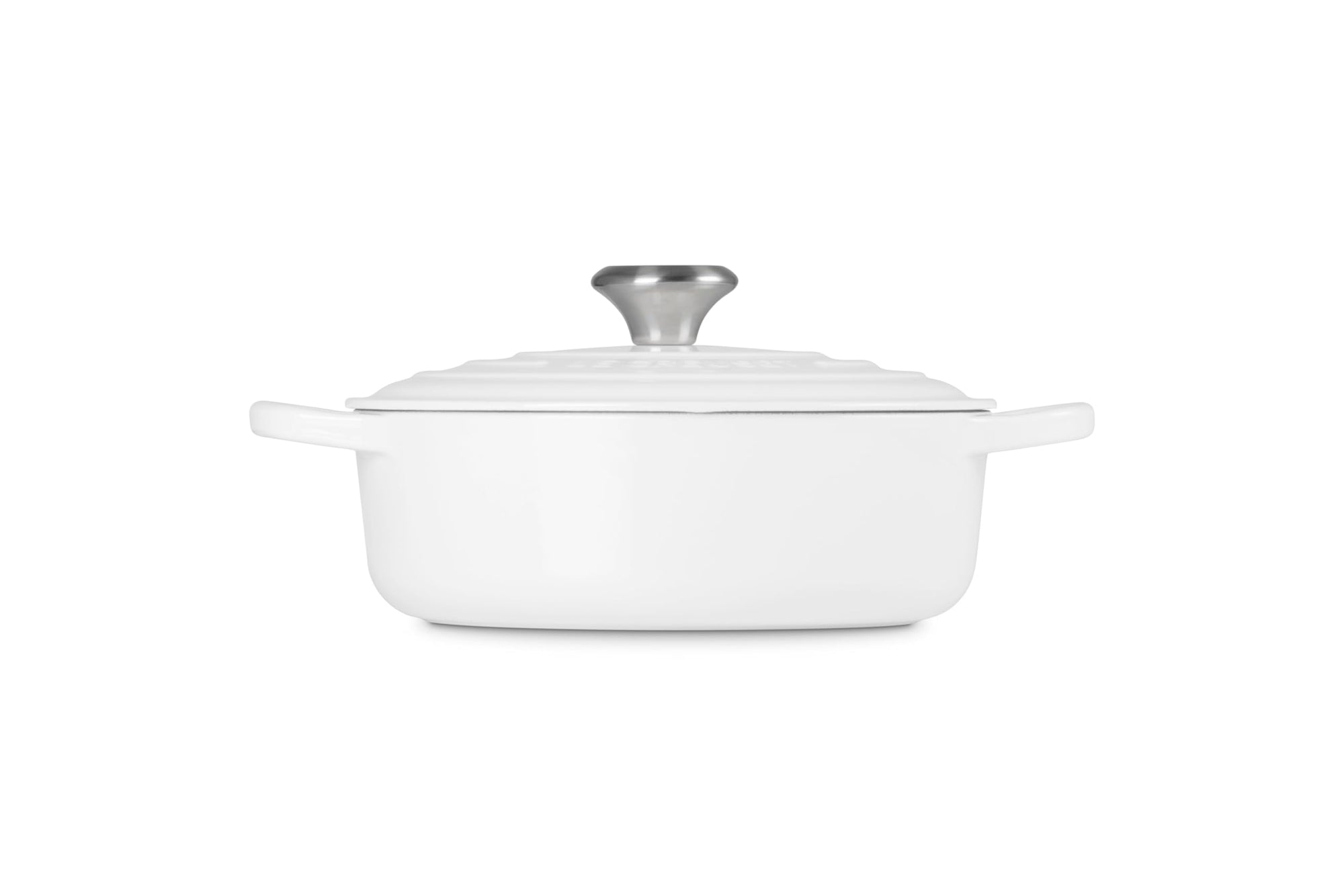 Side view of 3.5 qt white Le Creuset Signature Round Wide Dutch Oven with a lid displayed on a white background