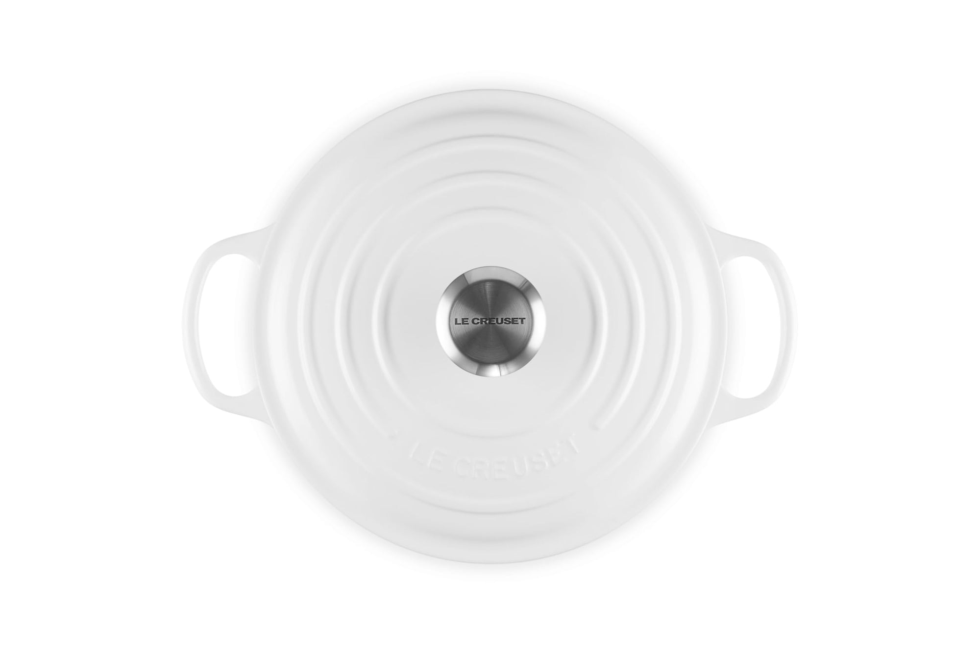 Top view of 3.5 qt white Le Creuset Signature Round Wide Dutch Oven with a lid displayed on a white background