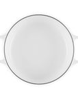 Top view of 3.5 qt white Le Creuset Signature Round Wide Dutch Oven displayed on a white background