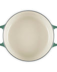 Top view of 3.5 qt artichaut Le Creuset Signature Round Wide Dutch Oven displayed on a white background