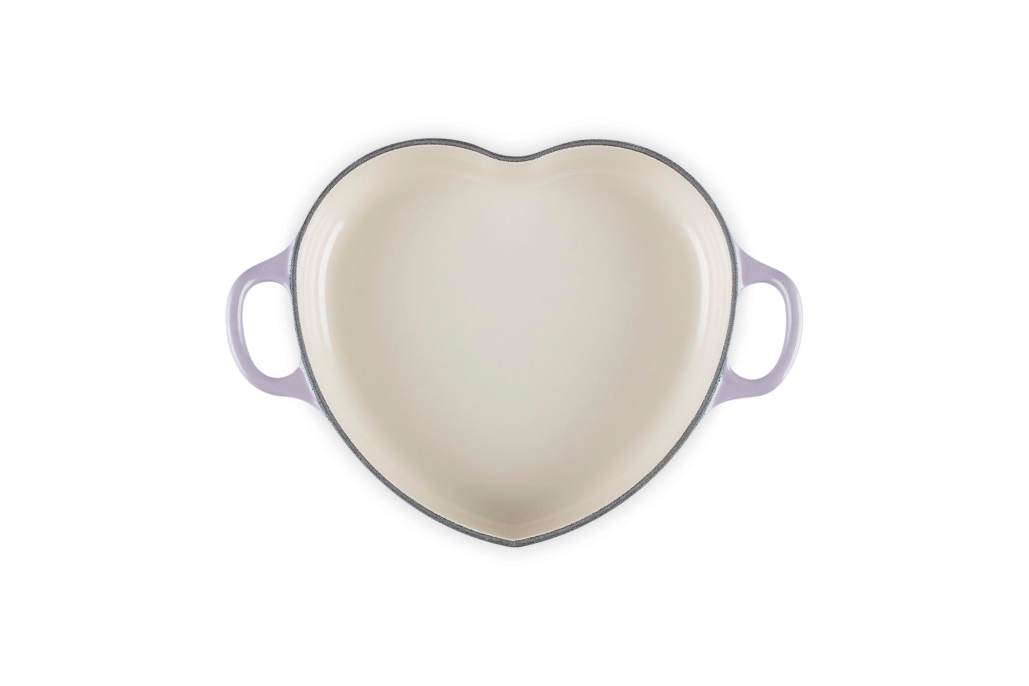 Top view of provence heart shaped 1.25 qt cocotte with handles displayed on a white background
