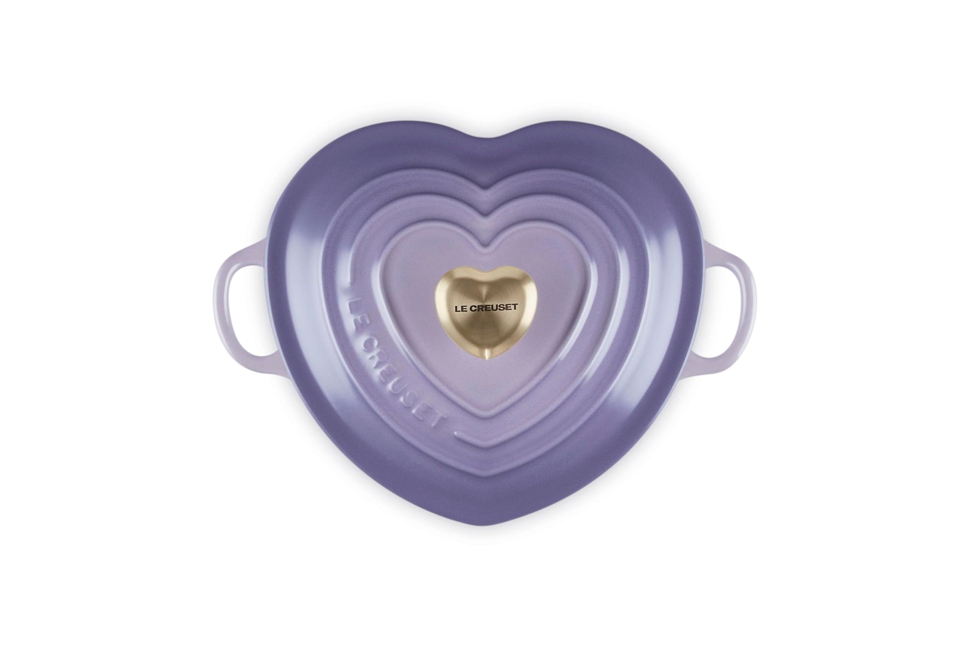 Top view of provence heart shaped 1.25 qt cocotte with handles and a light gold heart knob displayed on a white background