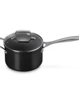Le Creuset Essential Non-stick Ceramic 3 qt Saucepan with Lid and handle displayed on a white background