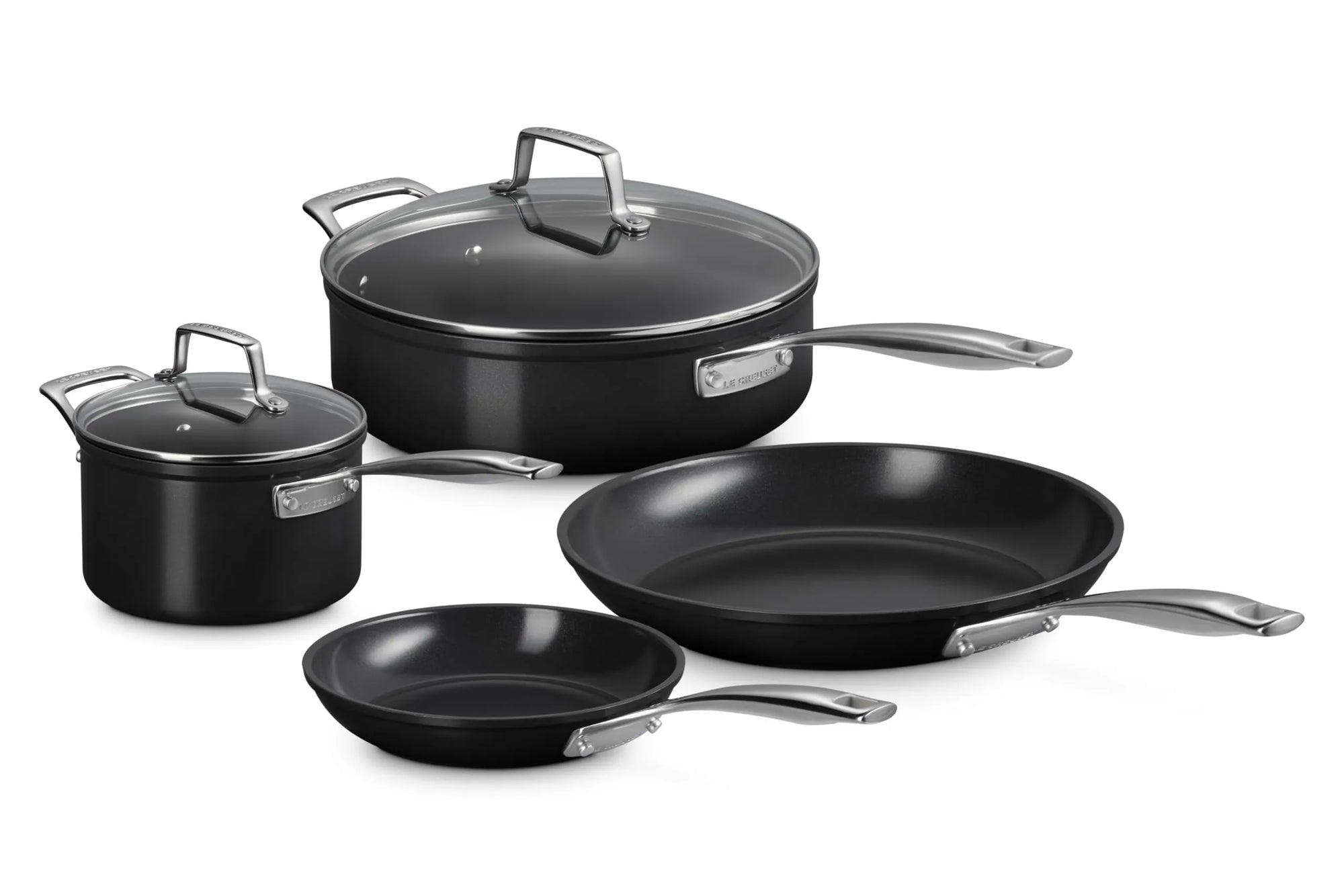 Set of 6 Le Creuset Essential Non-stick Ceramic Cookware Set displayed on a white background