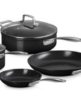 Set of 6 Le Creuset Essential Non-stick Ceramic Cookware Set displayed on a white background