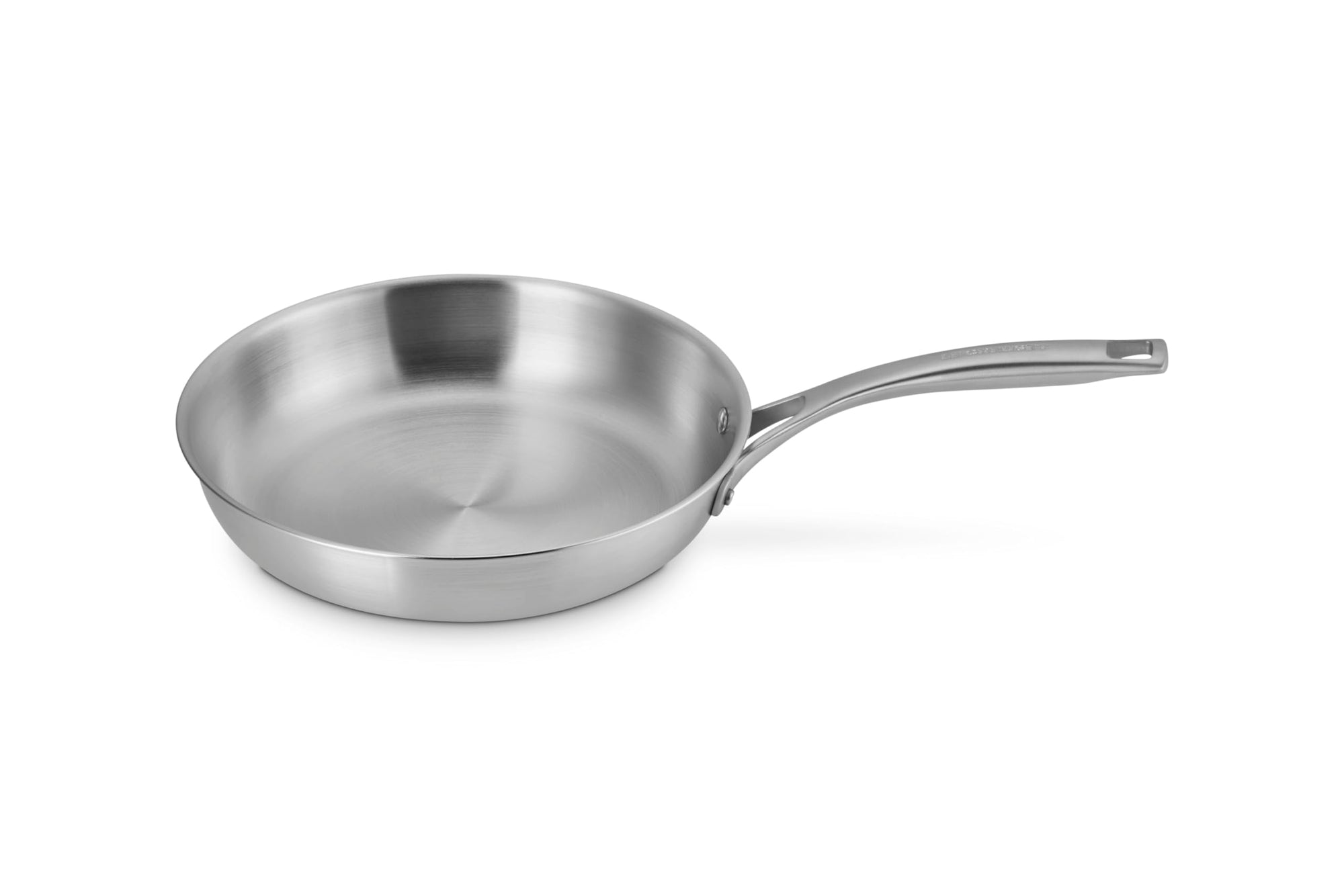 Le Creuset stainless steel saucepan with handles displayed on a white background