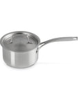 Le Creuset stainless steel pot with handles and lid displayed on a white background