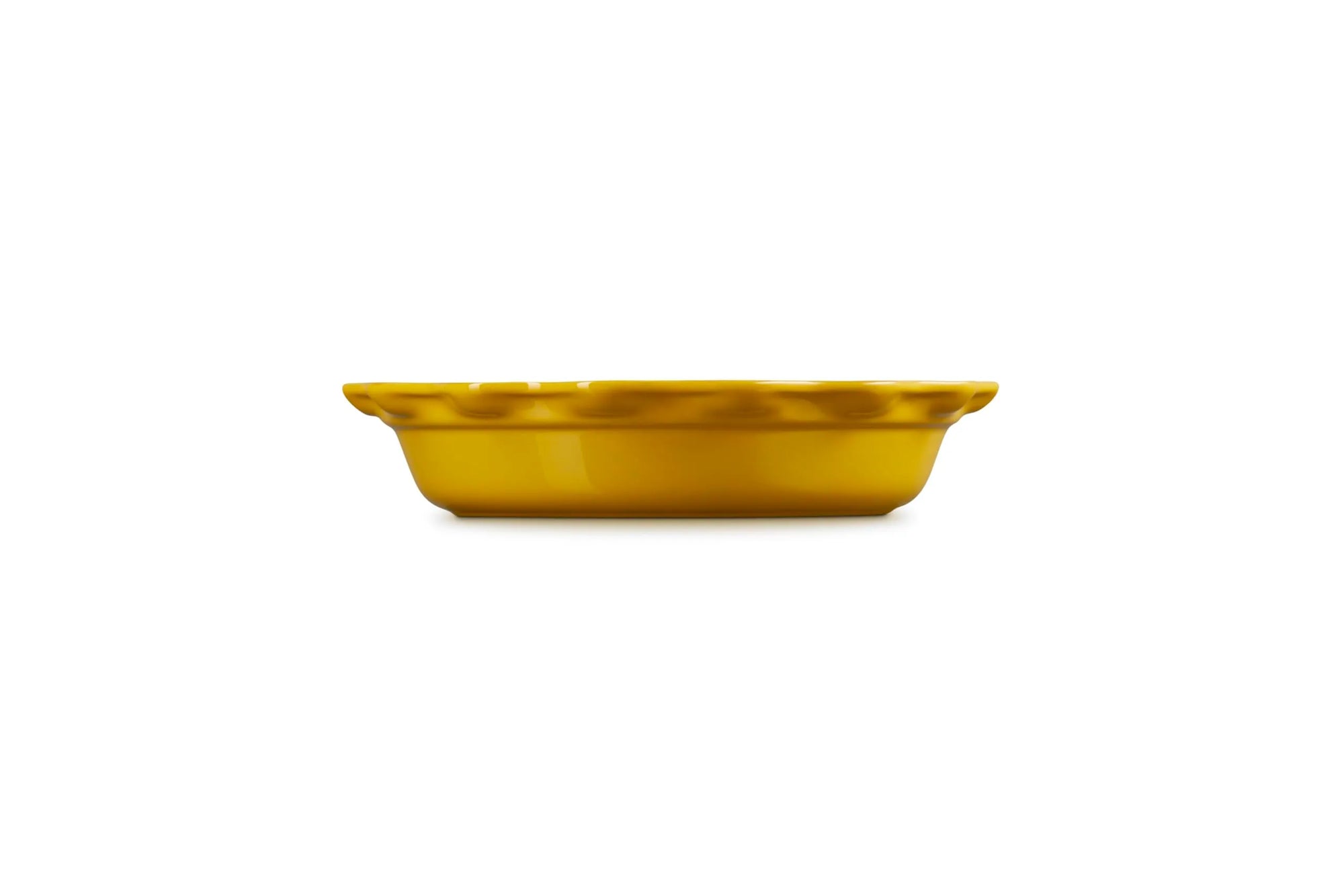 A small round yellow ceramic dish with a fluted rim, shown from a side profile against a solid white background.