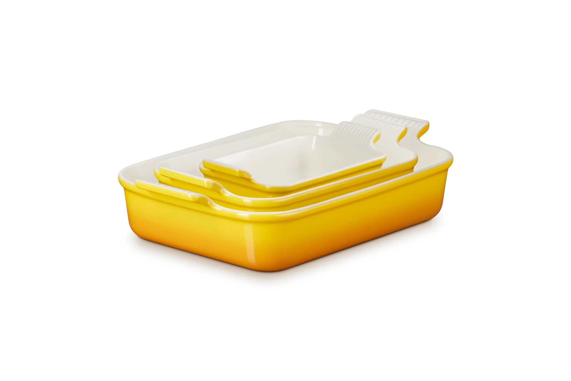 A set of three rectangular yellow baking containers, arranged in a nested stack on a white background.