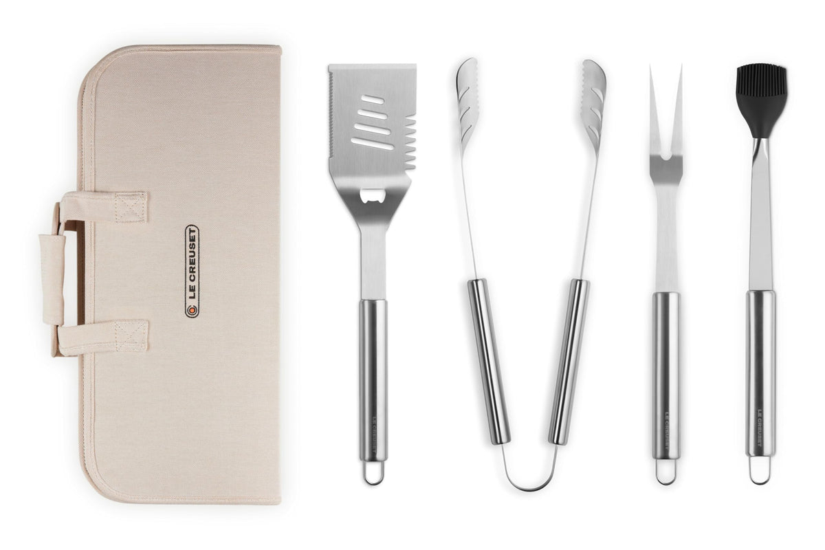 Set of barbecue tools with a carrying case on a white background