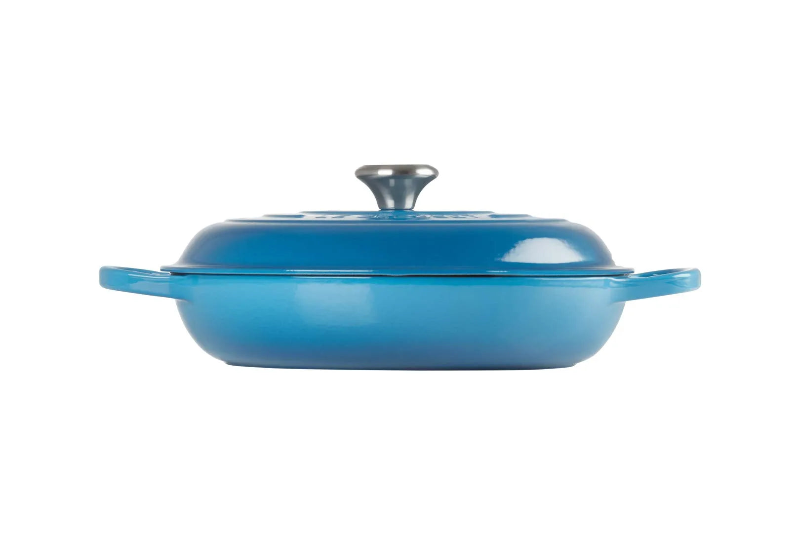 A blue enameled cast iron Dutch oven with a matching lid and side handles, shown from a side view on a solid white background.