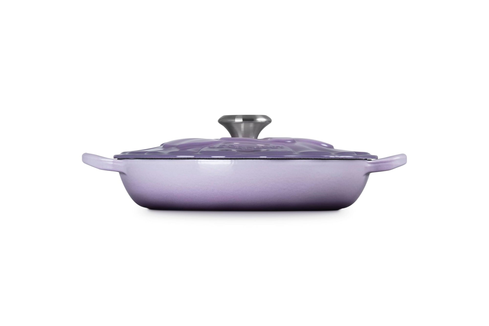 Purple enameled cast iron cookware with lid on a white background