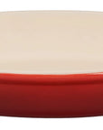 Side view of Cerise Heritage 1.7 Qt Oval Dish displayed on a white background
