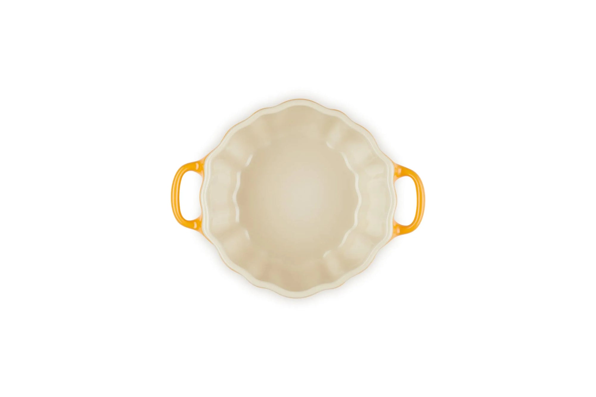 An oval ceramic baking dish with a cream-colored interior and bright yellow-orange handles, shown from a top-down view on a white background.