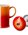 Flame Le Creuset Stoneware French Press, 34 oz. with attachment on the side displayed on a white background
