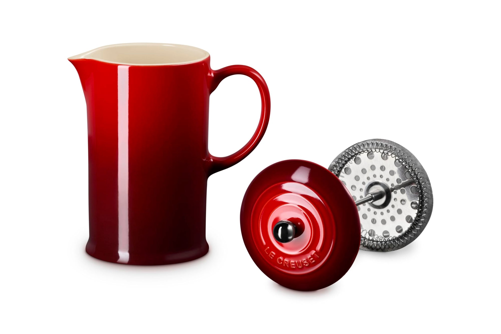 Cerise Le Creuset Stoneware French Press, 34 oz. with attachment on the side displayed on a white background