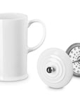 White Le Creuset Stoneware French Press, 34 oz. with attachment on the side displayed on a white background