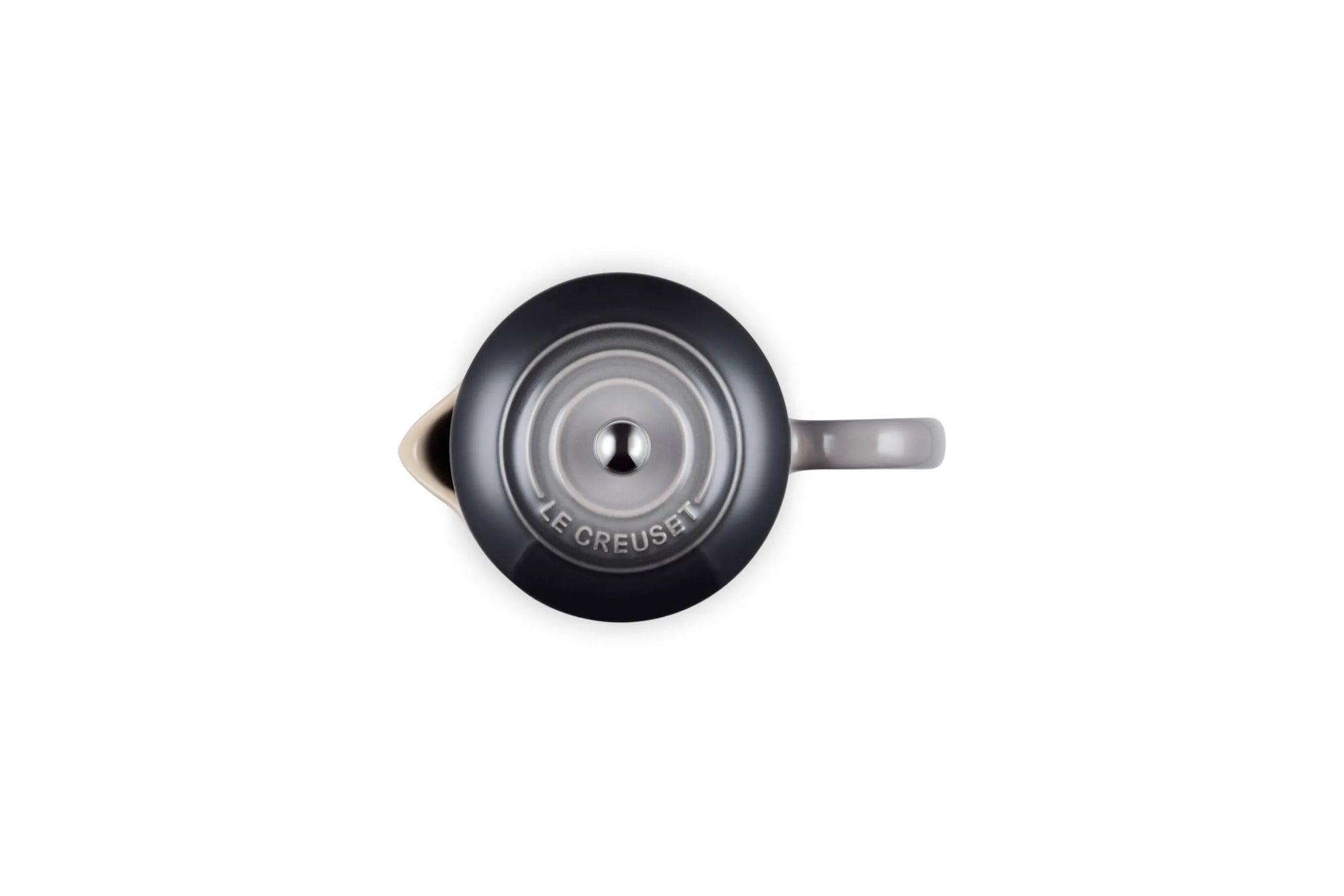 Top-down view of a Le Creuset French press with a dark gray exterior, with grayish lid, and a light gray handle on a white background.