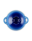 Top view of blue ceramic pot with lid that looks like a blueberry on a white background