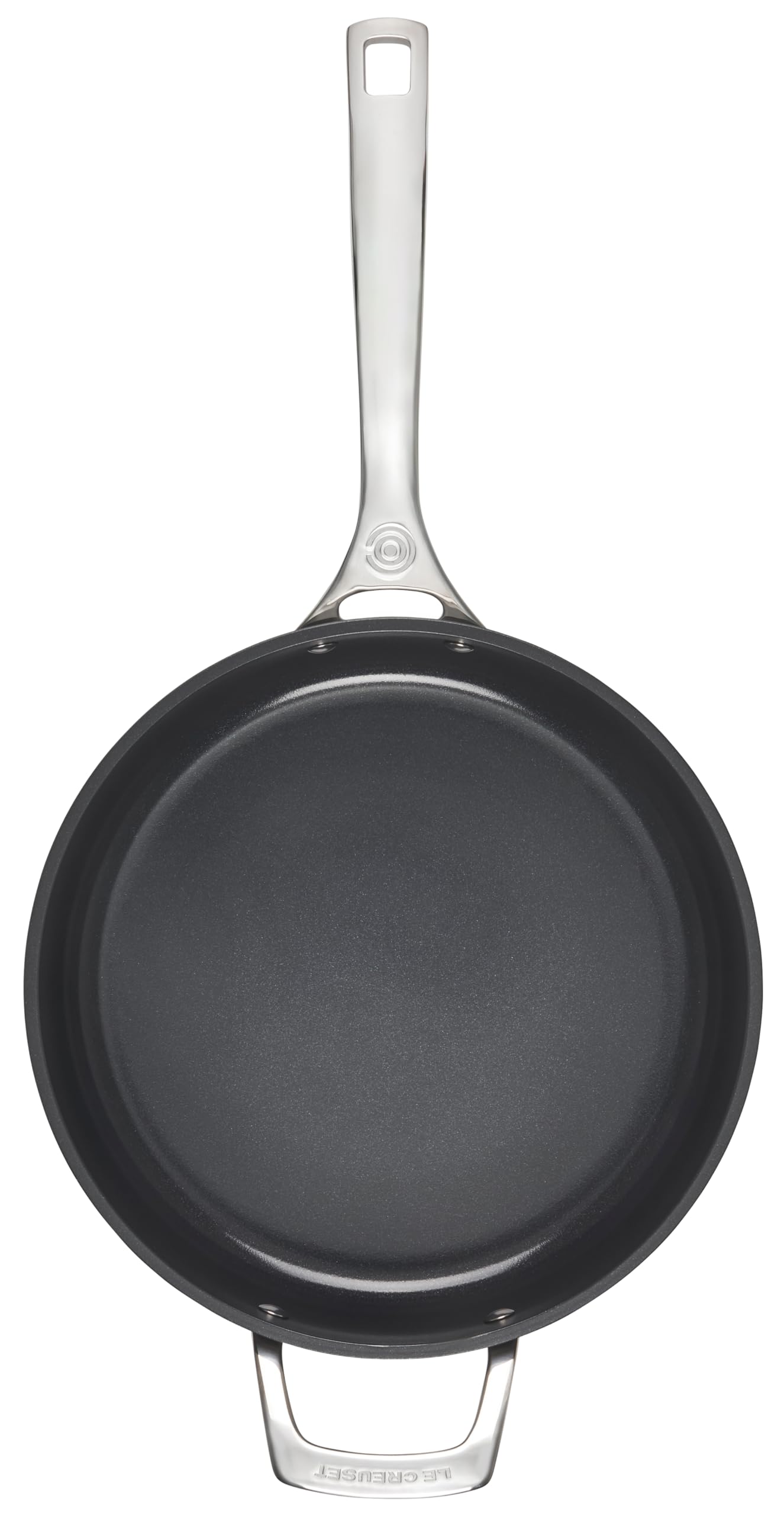 Top view of black frying pan with a silver handle on a white background