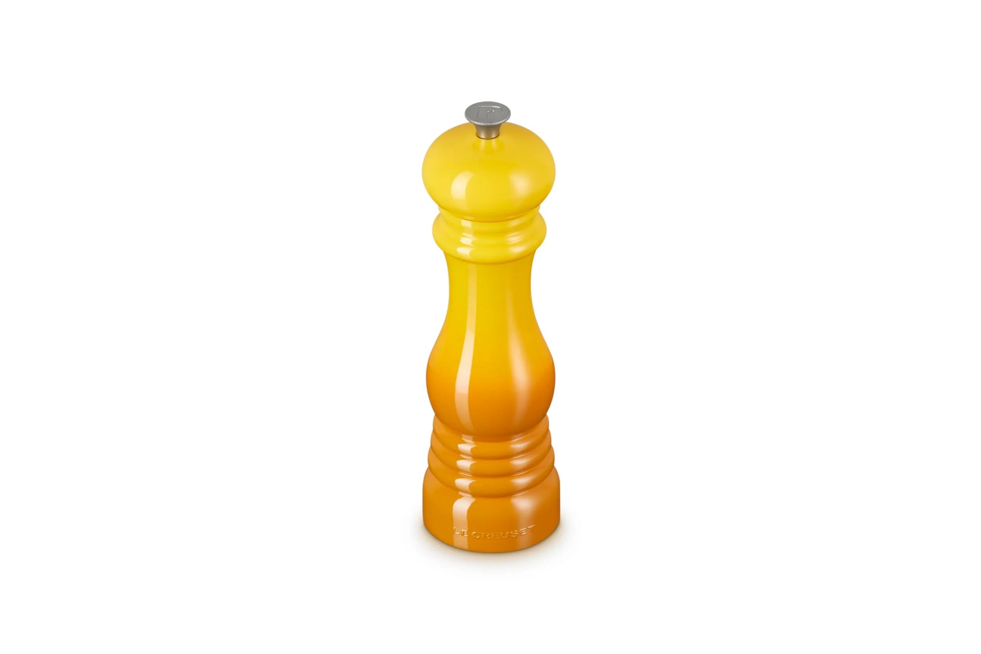 A yellow-to-orange gradient pepper mill with a silver metal top, centered on a plain white background.