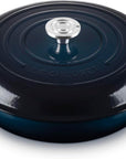 Dark blue Le Creuset 5 Qt. Signature Cast Iron Braiser displayed on a white background