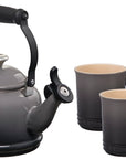 Oyster stovetop kettle with two oyster colored mugs