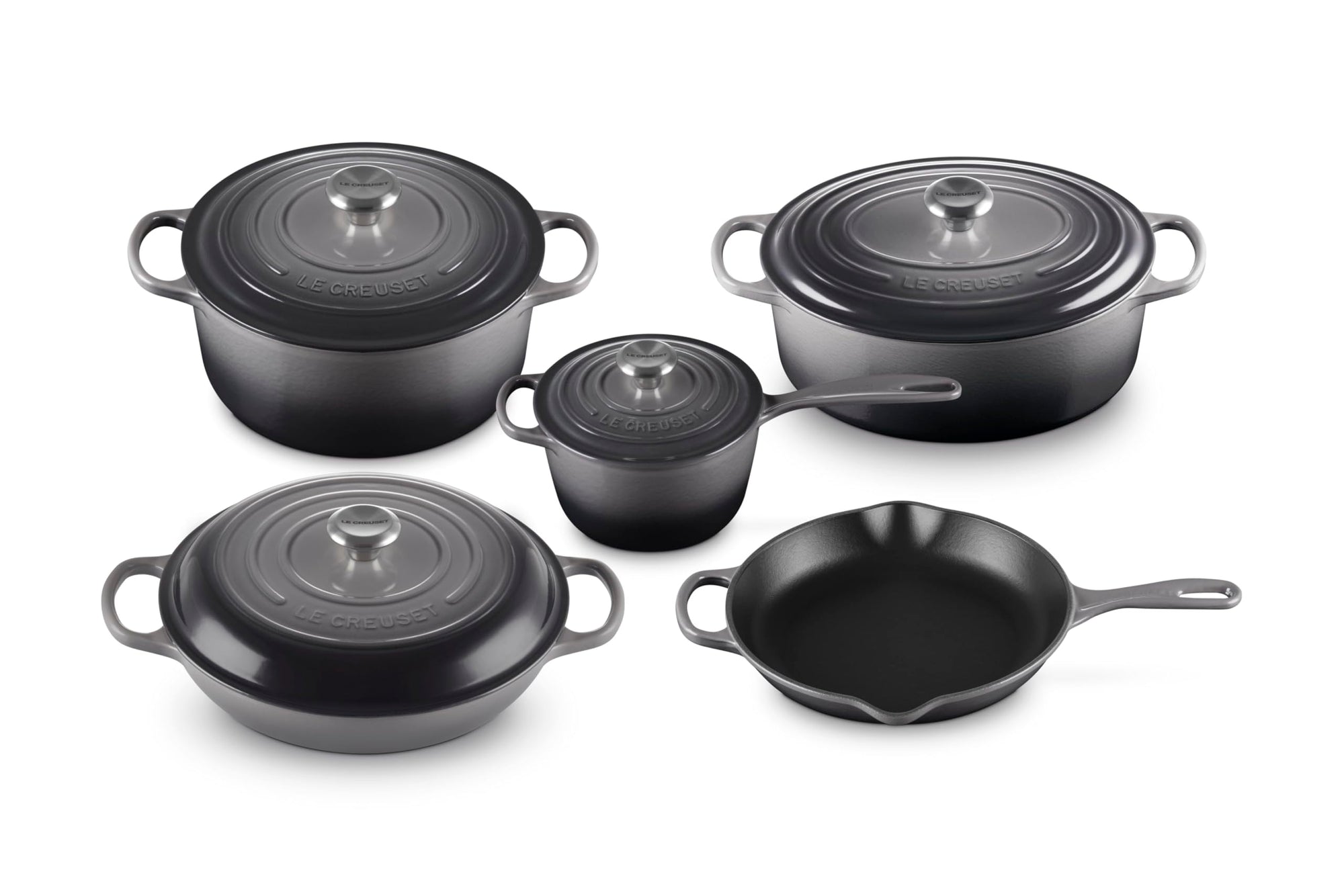 Set of 5 oyster cookware with lids  on a white background