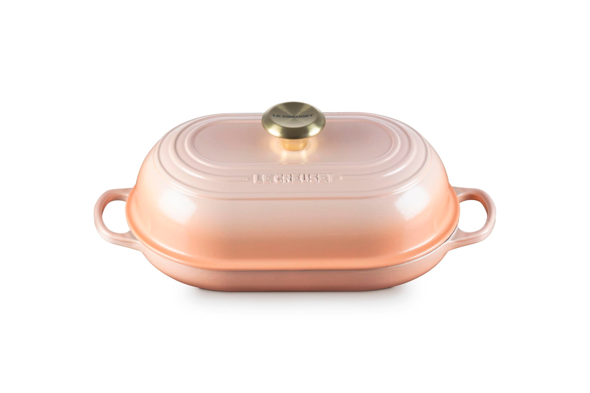 Peche bread oven pan with lid and handles displayed on a white background