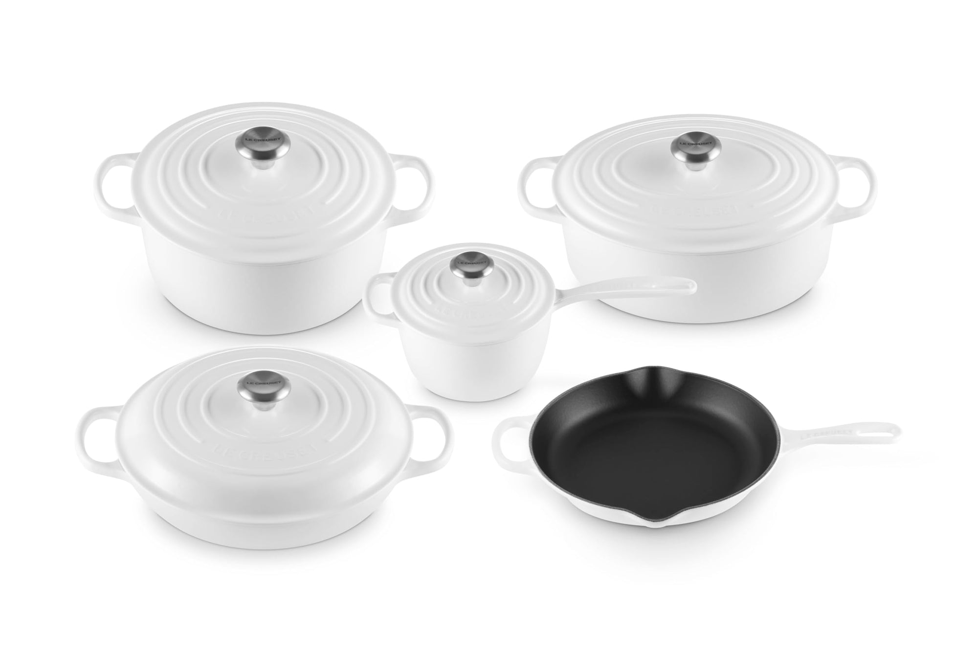 Set of 5 white cookware with lids  on a white background