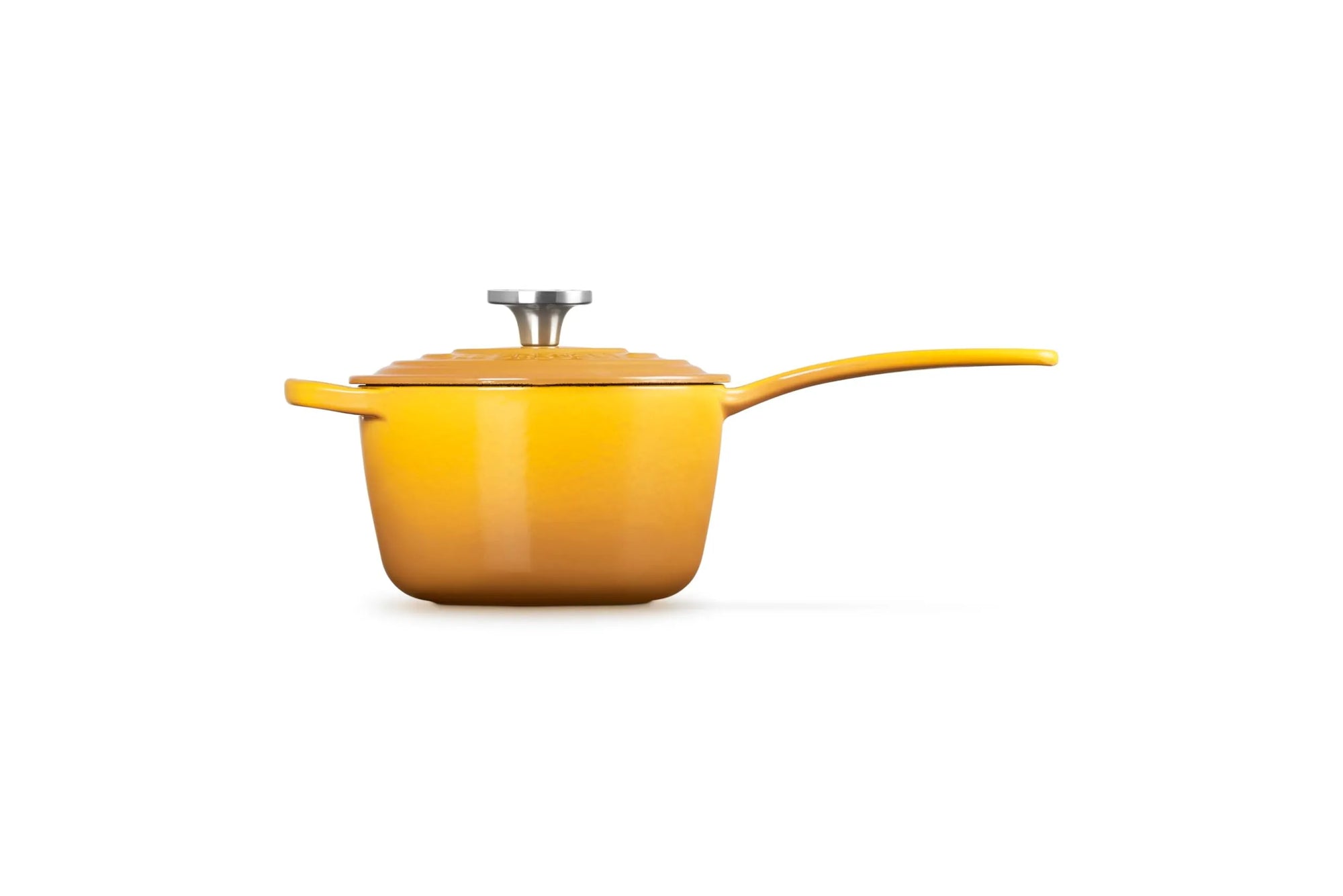 A yellow enameled saucepan with a matching lid and long handle, photographed on a clean white background.