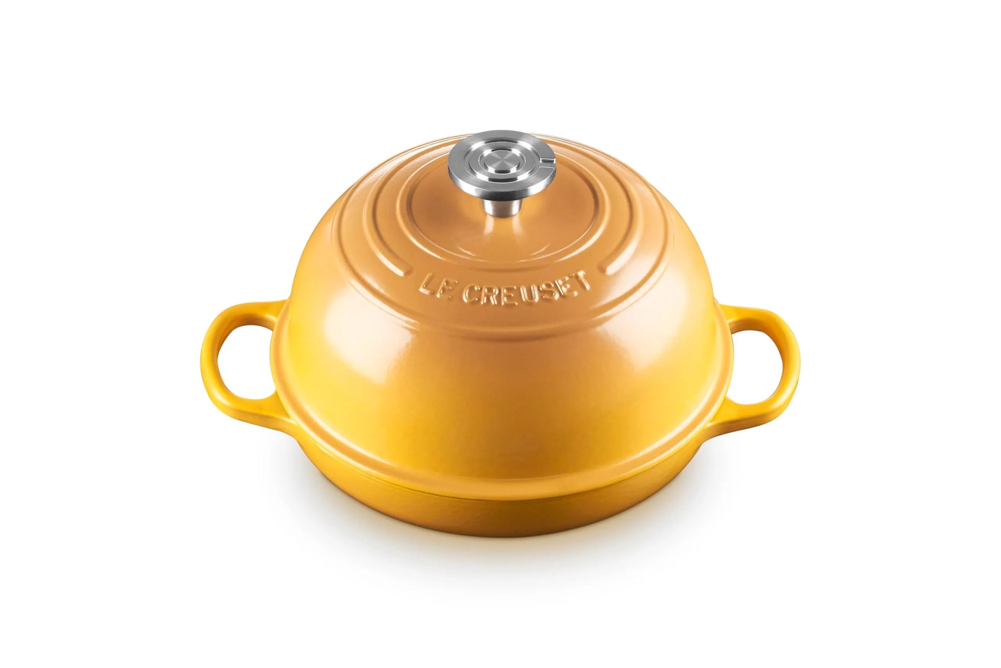 A yellow Le Creuset enameled cast iron pot with a matching lid, featuring side handles and a silver knob, set against a plain white background.