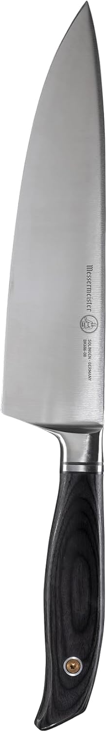 Chef's knife with a black handle on a white background