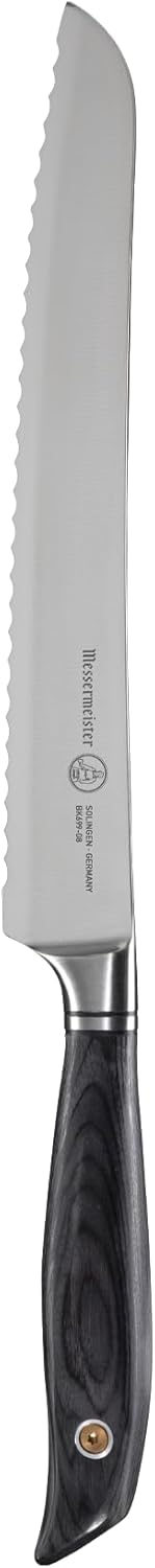 Serrated knife with a black handle on a white background