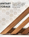A close-up of a wooden kitchen knife block with diagonal slats and a base, shown against a light hexagonal tile background with the text 'SANITARY STORAGE' and a descriptive caption.