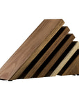 A modern geometric wooden knife block made of multiple angled wood panels in different wood tones, arranged in a fan-like structure on a plain white background.