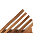 A modern wooden knife block with five angled slats supported by a triangular base, shown on a plain white background.
